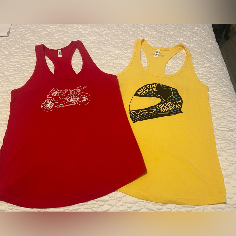 2 Moto GP tank tops by next level. Size XL in red and yellow. Good condition.